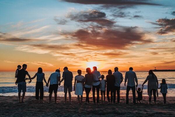 Family enjoying sunset on beach, Vanuatu 