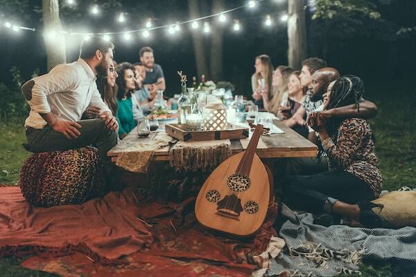 Group of friends enjoying outdoor dinner, Vanuatu 