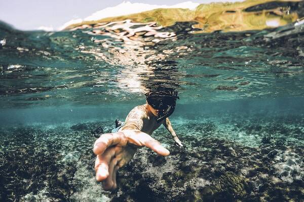 Boy snorkelling underwater, Vanuatu 