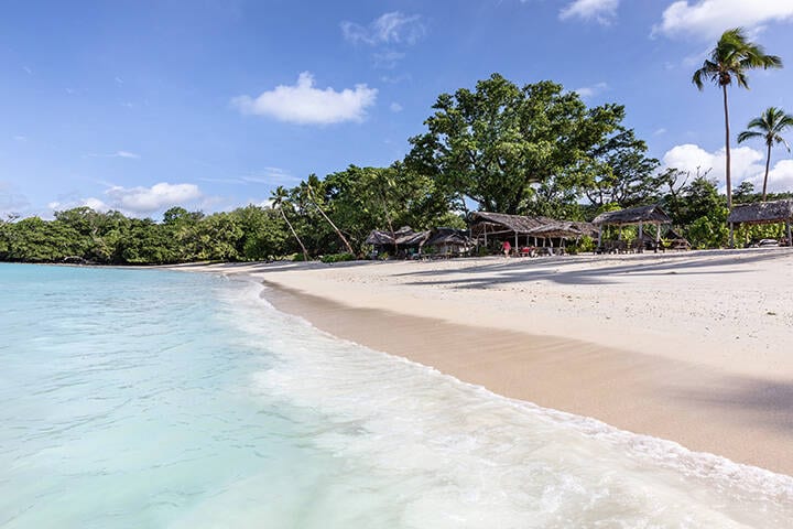 idyllic sand beach blue lagoon champagne coast Oceania