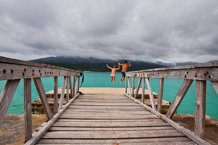 A young couple cool off at Mystery Island, Vanuatu