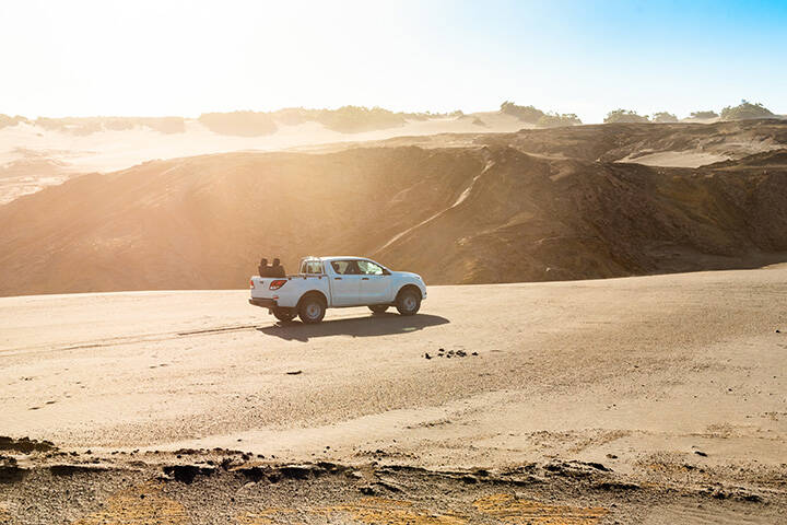 Tourists in the off road car is going to the volcano Yasur, Tanna Island, Vanuatu.