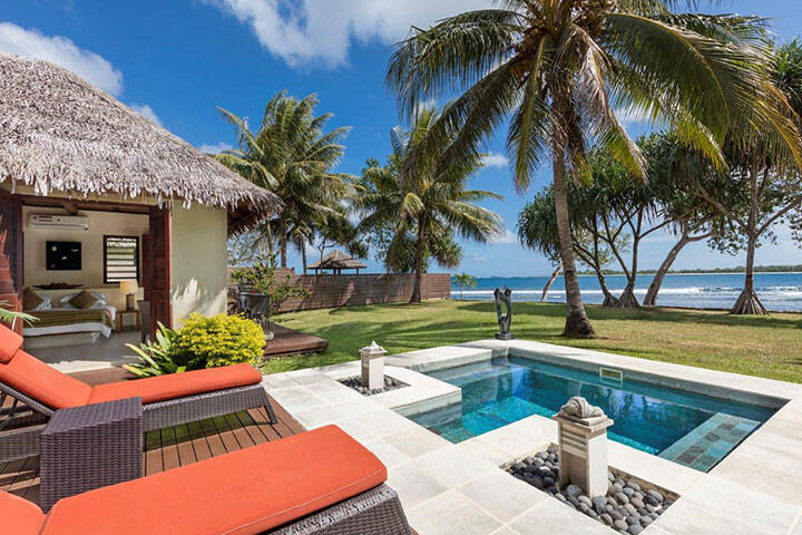 Beds and private pool at a villa at Eratap Beach resort