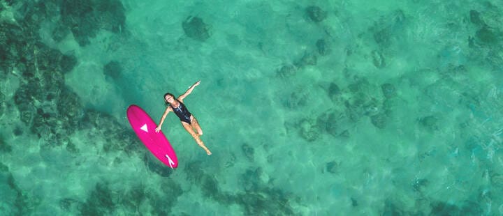 Aerial photo of a surfer on the water, Bali