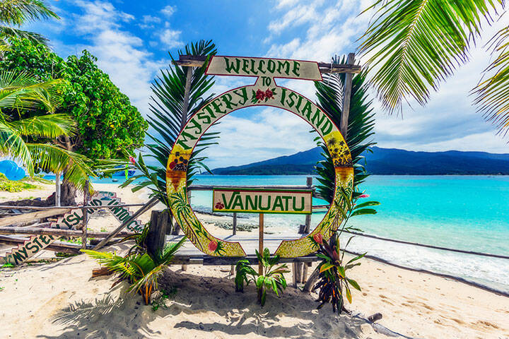 Welcome sign at a beach in Mystery Island, Vanuatu