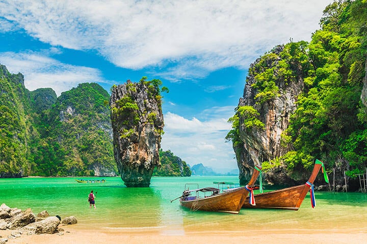 Scenic landscape of James bond island with boat for traveler Phang-Nga bay, Thailand