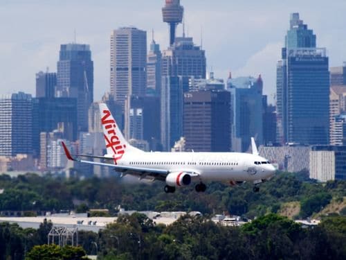 Virgin Australia 737 arriving at Sydney Kingsford SmithAirport. Melbourne to Sydney flights landing.