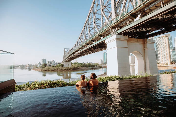 Rooftop pool overlooking the river and Story Bridge