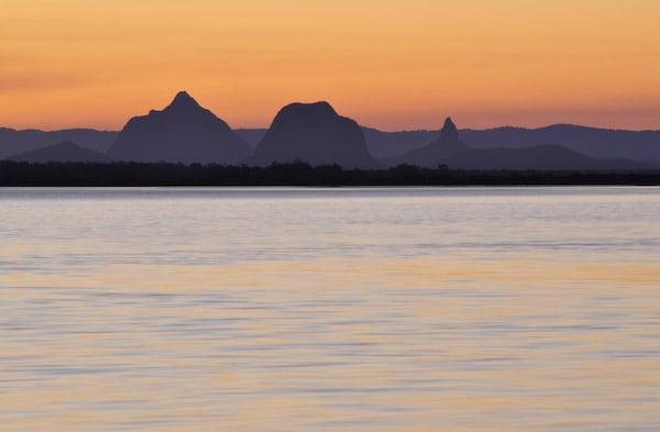 Bribie beach with glasshouse mountains in background