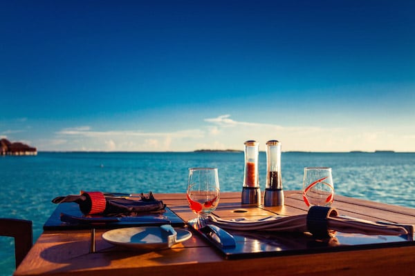 Wine and food set up on beachfront