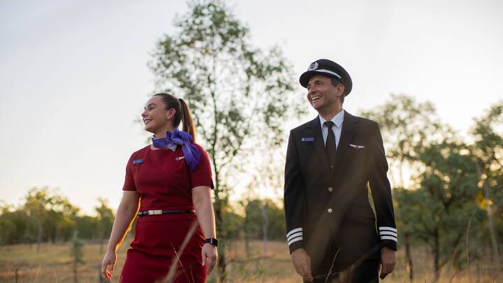Pilot and female flight crew in the Australia n bush