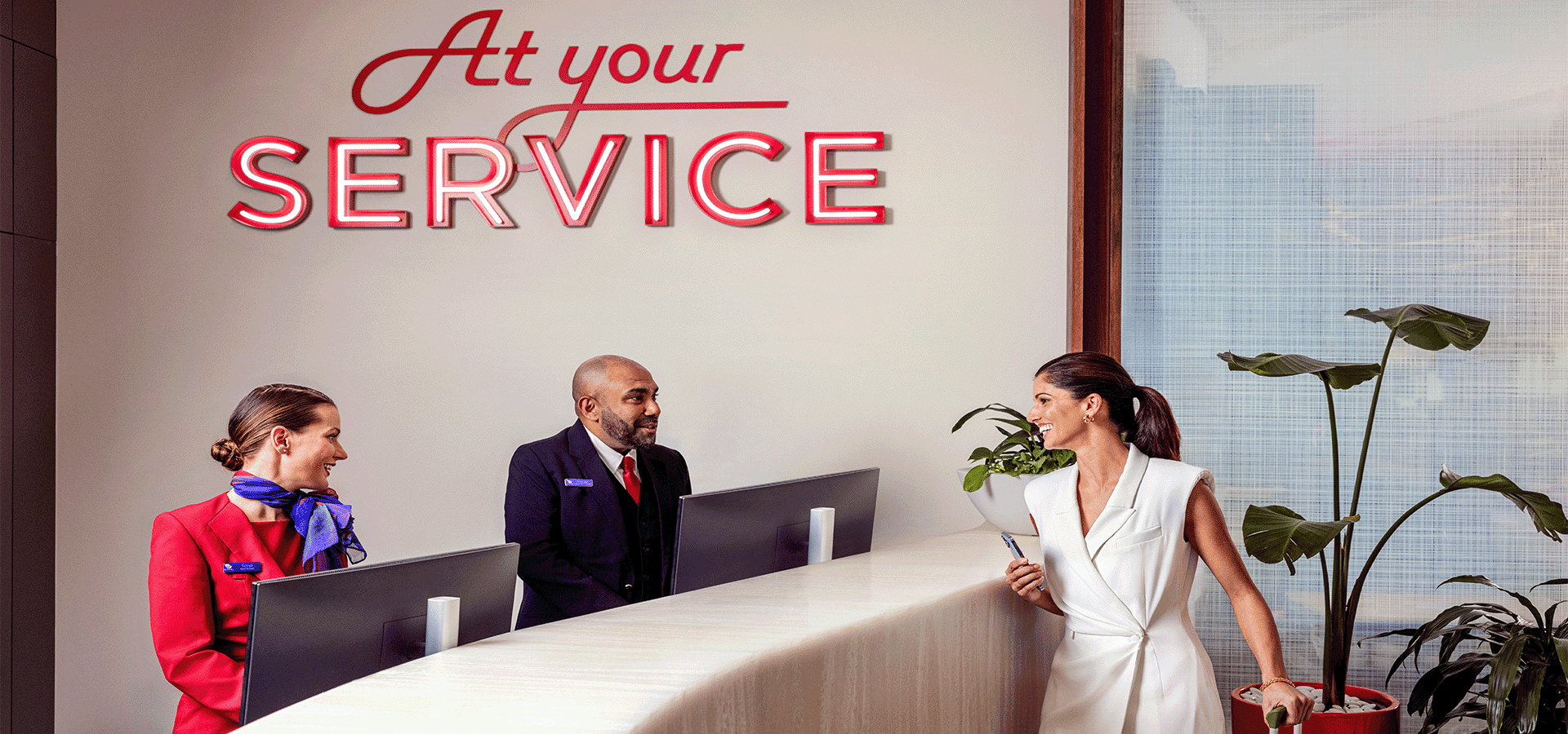 Virgin Australia guest speaking to agents at the Lounge entry desk
