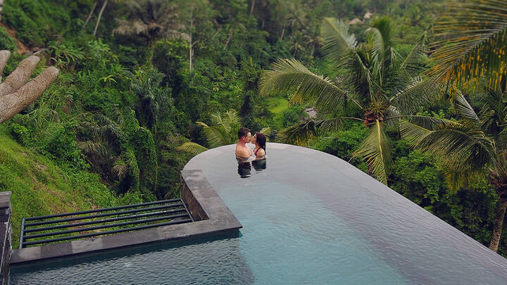 Couple in hotel pool.