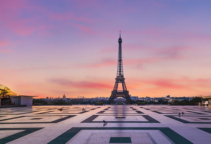 Eiffel tower in Paris at sunset.