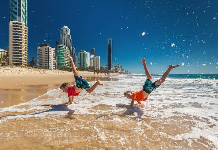 Kids playing at Gold Coast beach.
