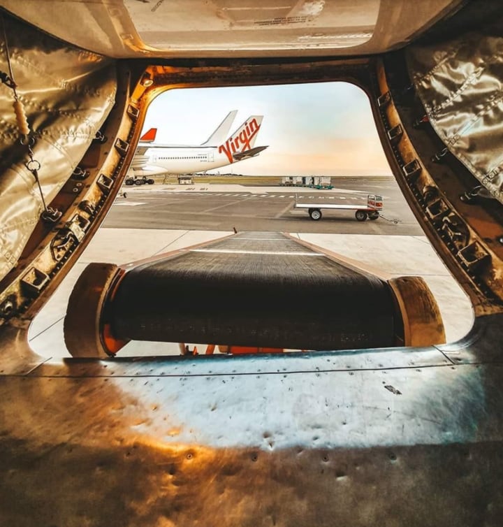Virgin Australia plane ready to be loaded with cargo