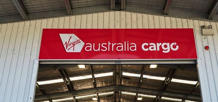 Virgin Australia Cargo sign above shed of Sydney Airport Cargo facility