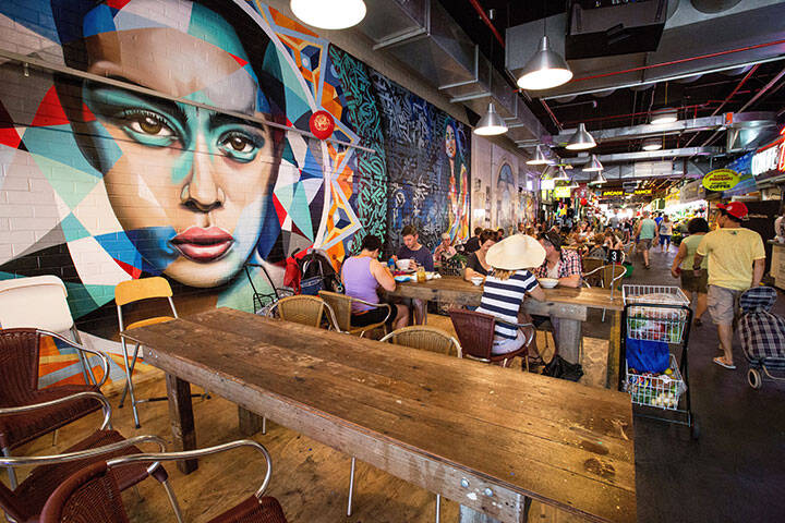Diners enjoying food at the Adelaide Central Market