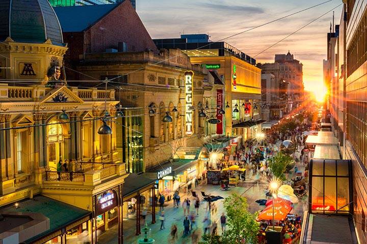 Shoppers at Rundle St at sunset