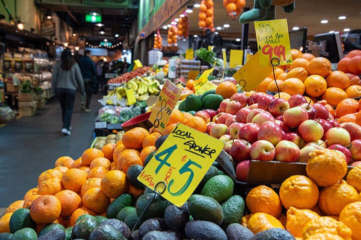 Fruit at Adelaide Central Market with shoppers out of focus  