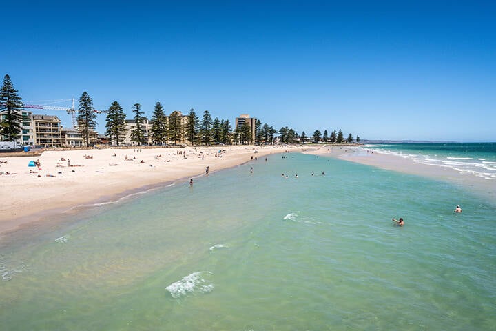 Distant view of Glenelg beach in Adelaide suburb on hot sunny summer day in SA Australia  