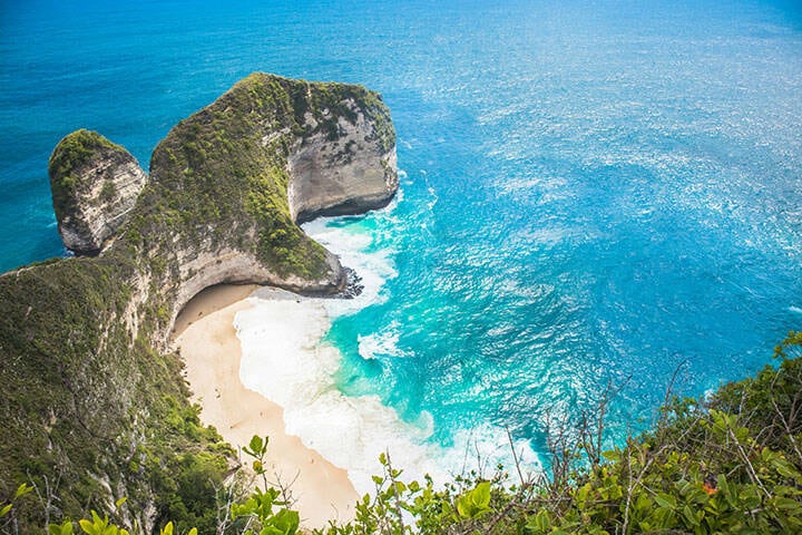 Aerial view of the Trex rock formation at Kelingking Beach in Nusa Penida