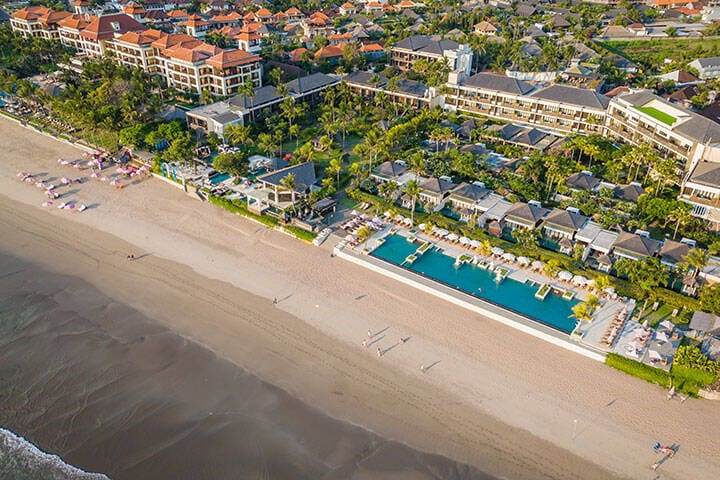 Aerial view of Seminyak beach coastline. Kuta Beach resort in Bali, Indonesia