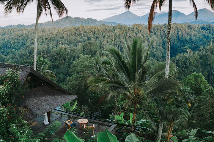 Hotel deck of Buahan overlooking the tranquil jungles of Bali