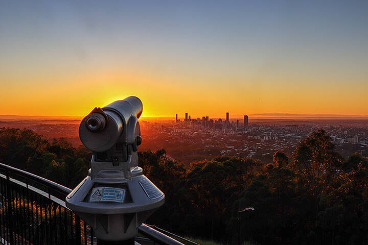Looking down toward the city from the Mount Coot-tha summit lookout at sunrise