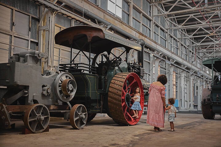 Mother and children exploring The Workshops Rail Museum at North Ipswich.