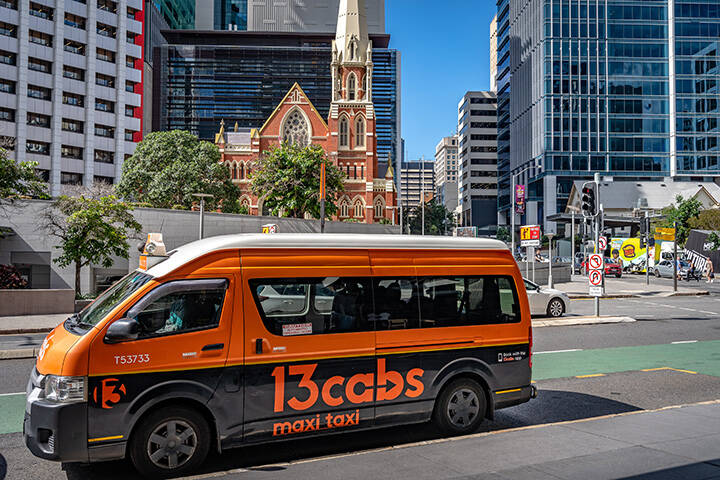 Brisbane, Australia - Mar 26, 2021: 13cabs maxi taxi van waiting for passengers