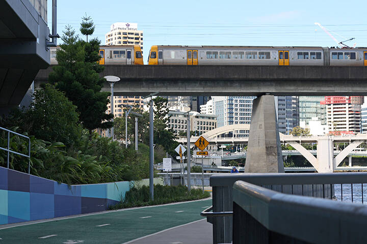 Brisbane train and city view from Bicentennial Bikeway, Brisbane, Australia