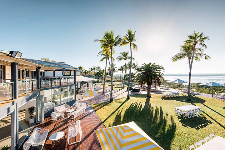 Outdoor area of Mangrove Hotel in Broome, overlooking the water