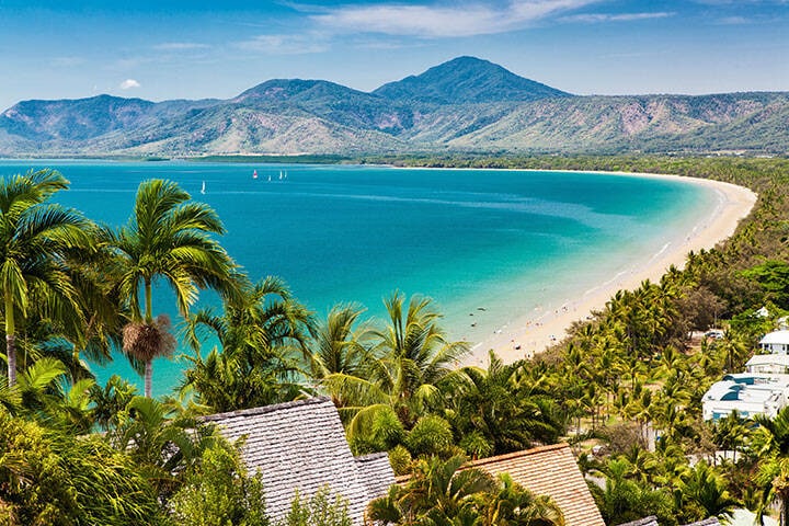 Port Douglas beach and ocean on sunny day, Queensland  