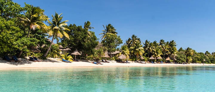 Idyllic turquoise water by an exotic beach in the Yasawa island in Fiji in the south Pacific ocean  