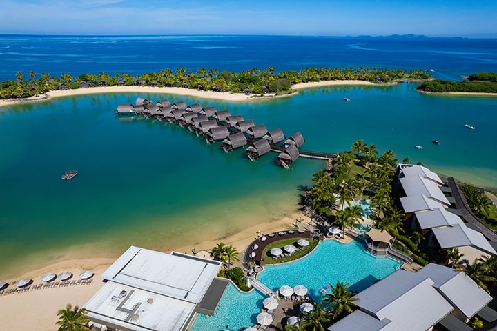 Overwater bungalows in Momi Bay