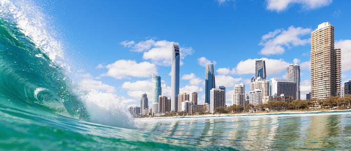 Blue waves rolling on Surfers Paradise beach, one of the main tourist attractions in Gold Coast