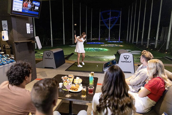 Group playing one of the many games on offer in Topgolf Gold Coast private bays