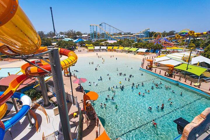 Crowds cooling off and enjoying the Cave of Waves at WhiteWater World