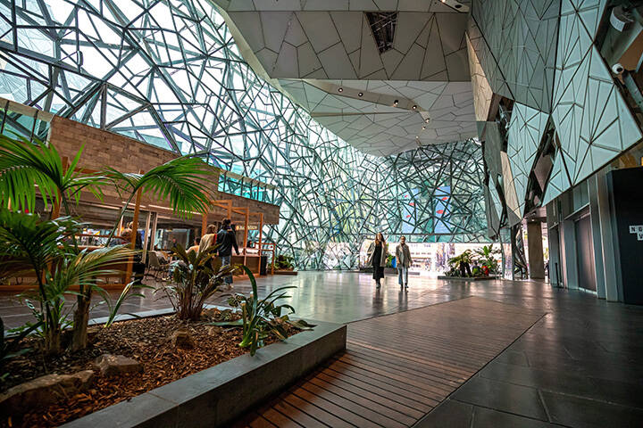 Visitors wandering through the unique architecture of the National Gallery of Victoria (NGV). The National Gallery of Victora is the prime place to discover classic and contemporary art from local and international artists. Spread over two impressive galleries just a short stroll from one another, explore a collection of major touring exhibitions from around the world as well as art work from Australian Indigenous and non-Indigenous artists.