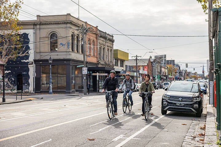 People cycling on Brunswick Street in Fitzroy
