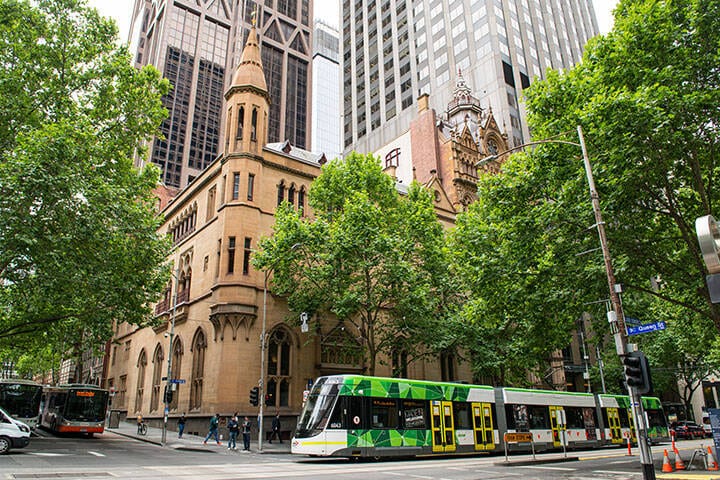 Tram running through Melbourne CBD