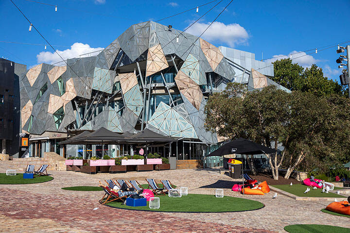 Federation Square, , a cultural and arts hub, in Melbourne city centre with distinct architecture and buildings design