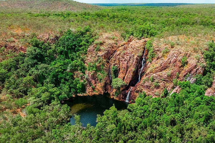 Wangi Falls, Litchfield National Park. Wangi Falls is the best-known and most popular attraction in Litchfield National Park - a park renowned for its accessibility and pristine natural beauty.  The falls are found near the western boundary of the park, 150 kilometres south of Darwin along sealed roads.