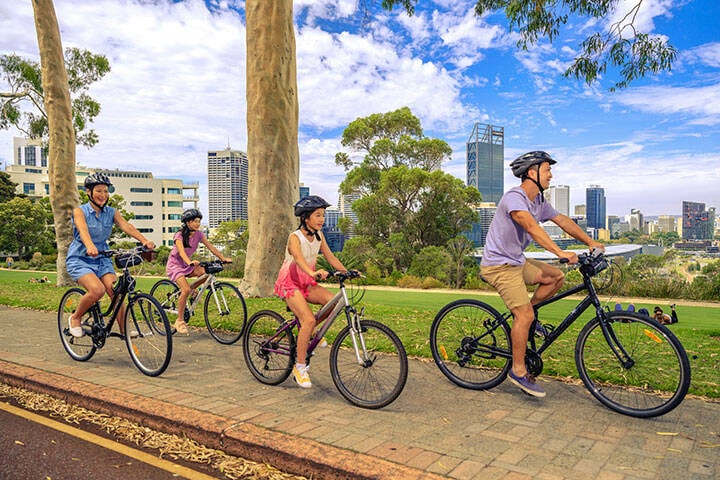 Family cycling at Kings Park and Botanic Garden. 
