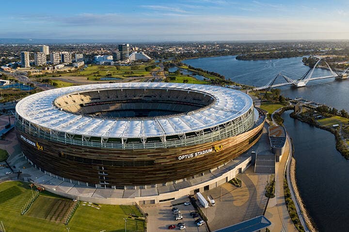 Panoramic aerial view of the Optus stadium and Matagarup bridge with the city of Perth, Western Australia in the background