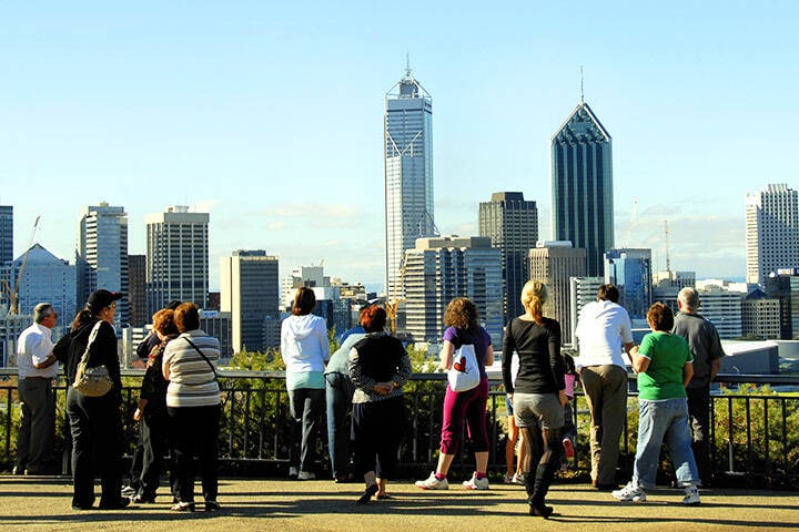 Tourists Looking down at the city of Perth from Kings Park