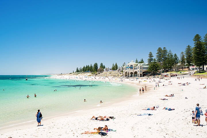 A busy Cottesloe Beach, Perth, Western Australia on a beautiful Summer afternoon.