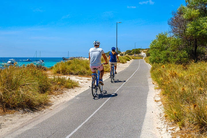 Couple Cycling near Longreach Bay, Rottnest Island 