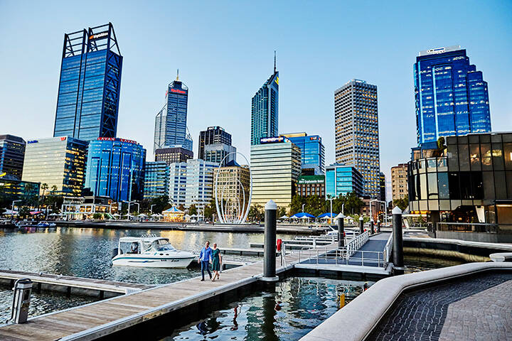 Couple walking in Elizabeth Quay, one of Perth's top attractions and things to do